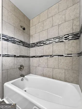 a bathroom with a bathtub