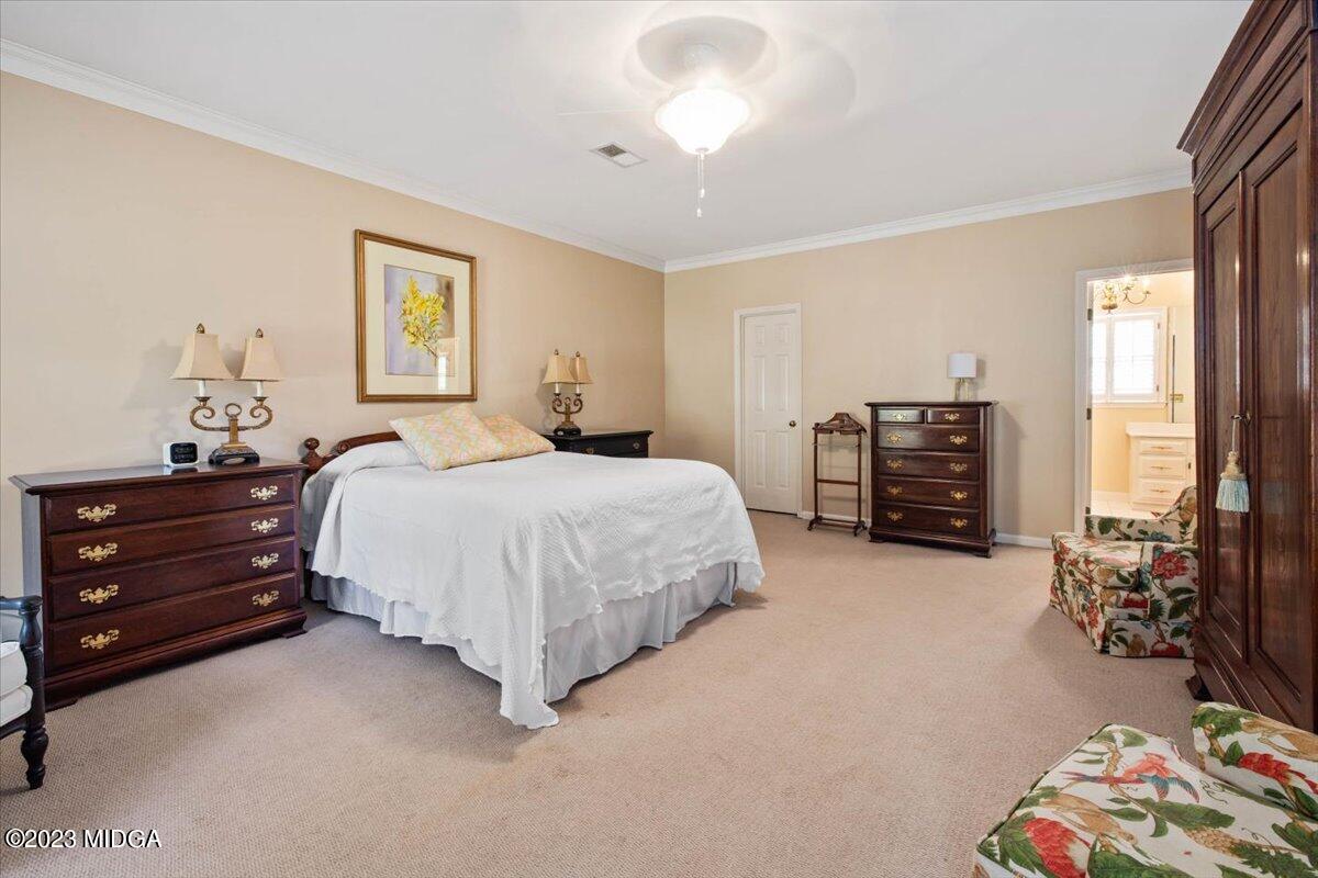 1158 St Andrews Drive Macon, GA 31210 - Photo 11 of 79 a bedroom with a bed furniture and a window