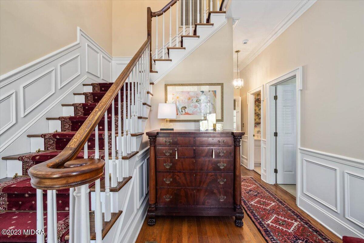 1158 St Andrews Drive Macon, GA 31210 - Photo 20 of 79 a view of entryway with wooden floor and stairs