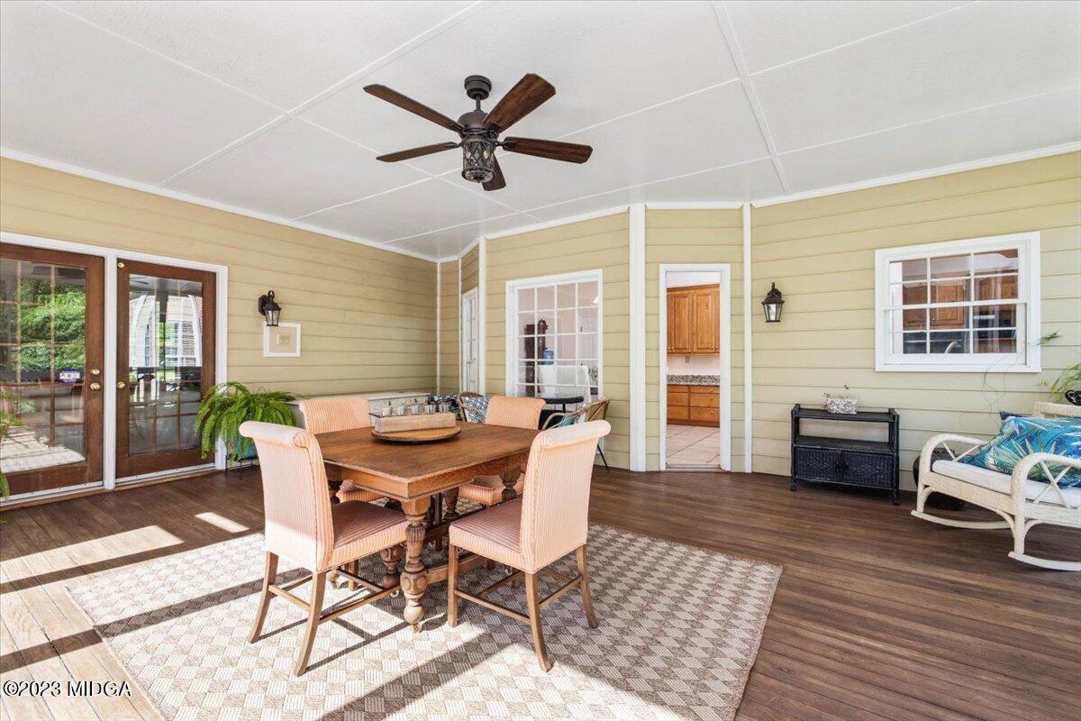 1158 St Andrews Drive Macon, GA 31210 - Photo 31 of 79 a dining room with furniture a window and wooden floor