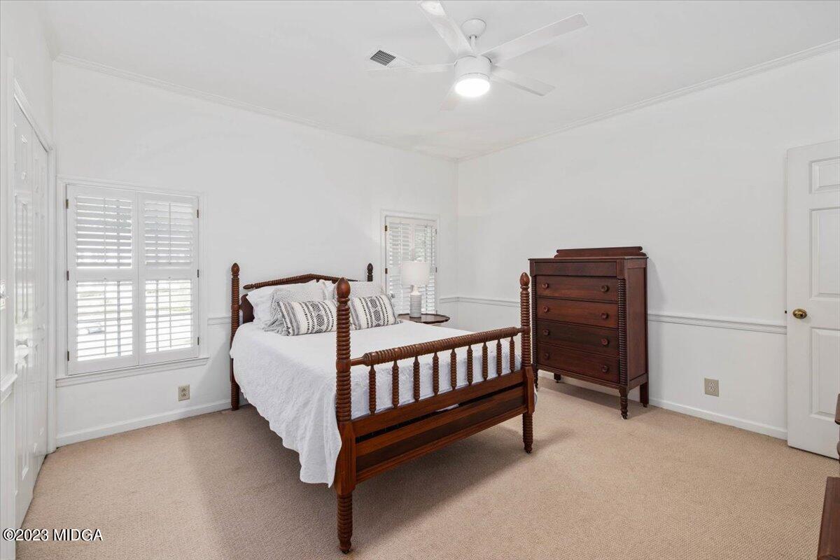 1158 St Andrews Drive Macon, GA 31210 - Photo 39 of 79 a bedroom with a bed and a window
