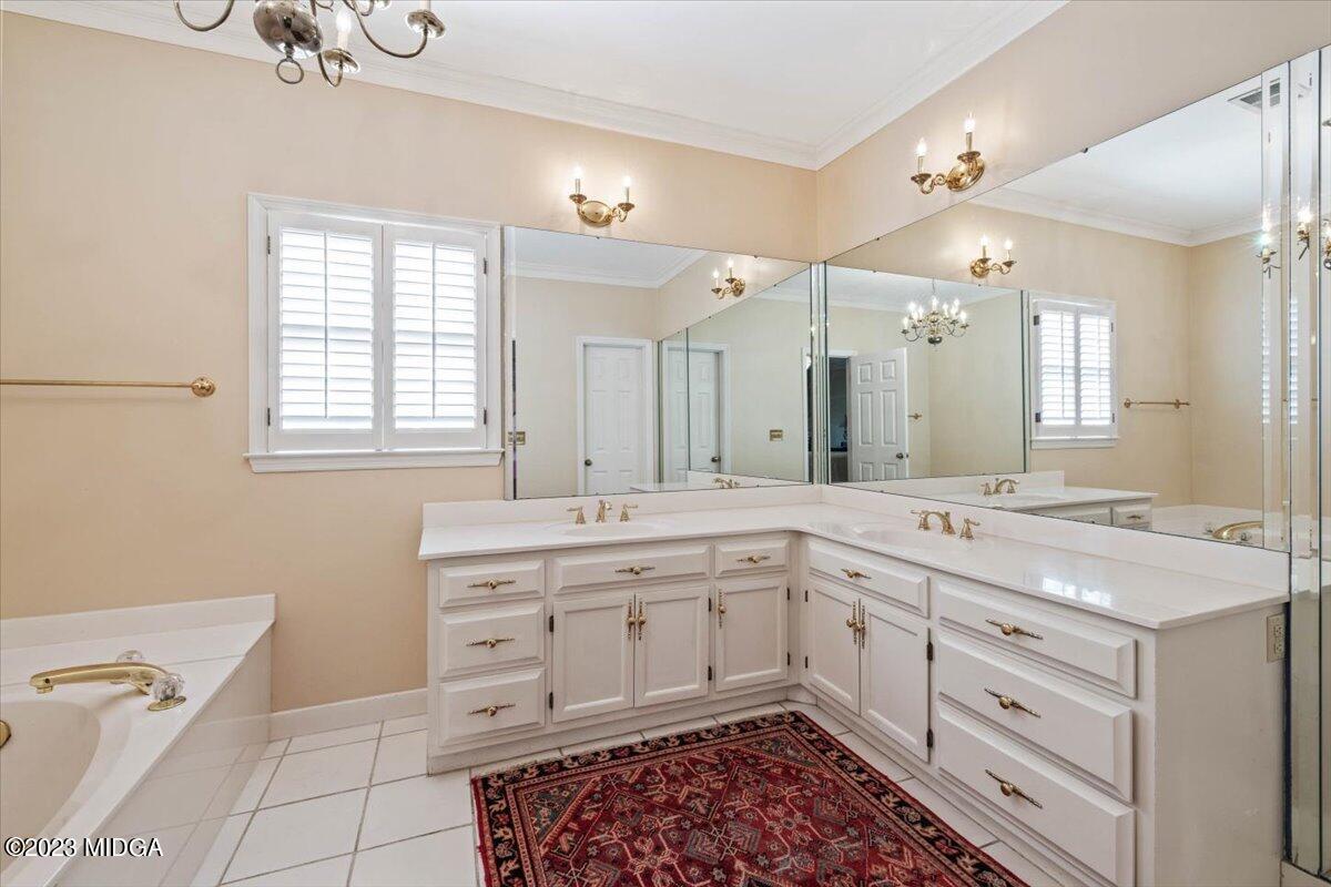 1158 St Andrews Drive Macon, GA 31210 - Photo 45 of 79 a spacious bathroom with a granite countertop sink mirror and a