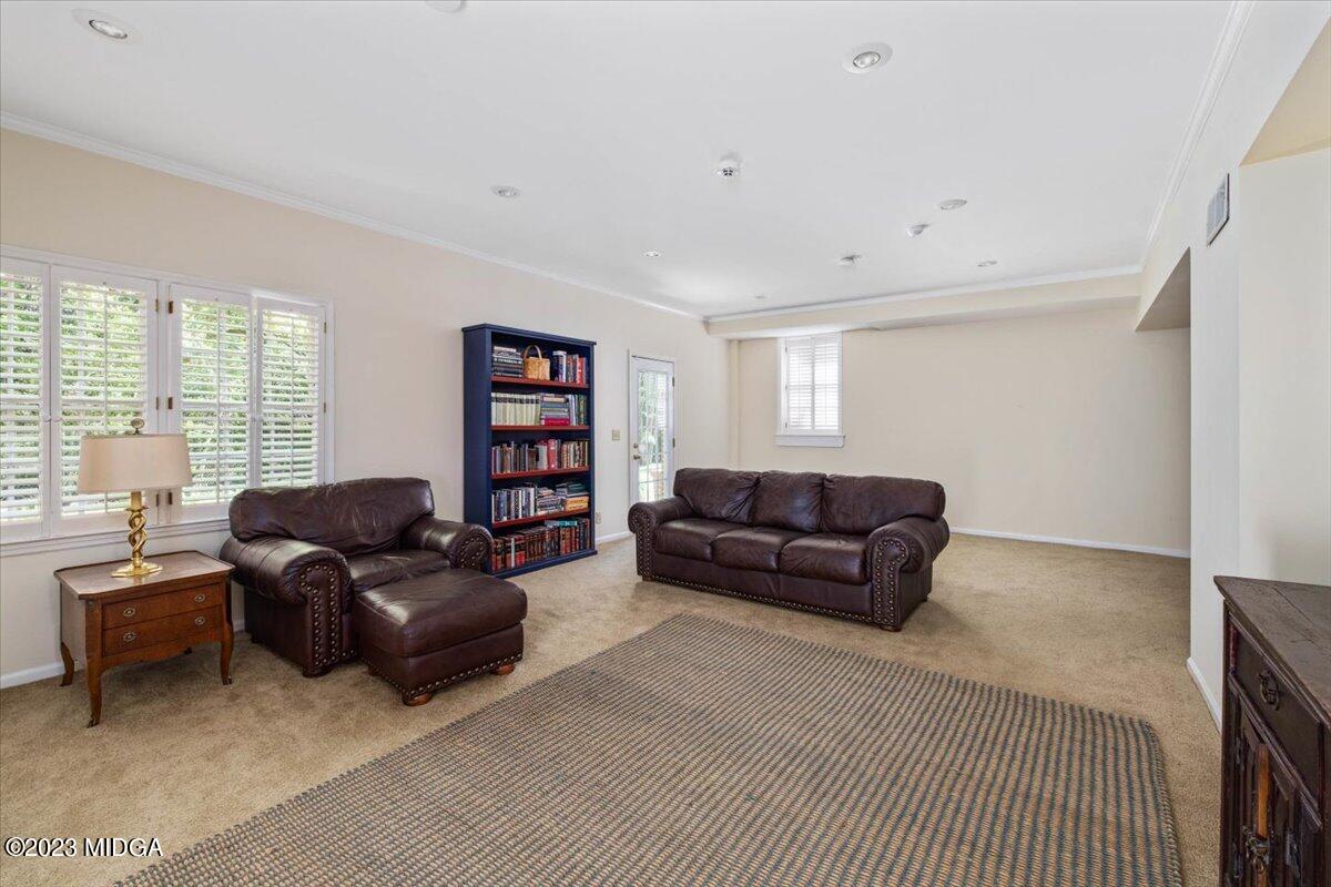 1158 St Andrews Drive Macon, GA 31210 - Photo 52 of 79 a living room with furniture and a window