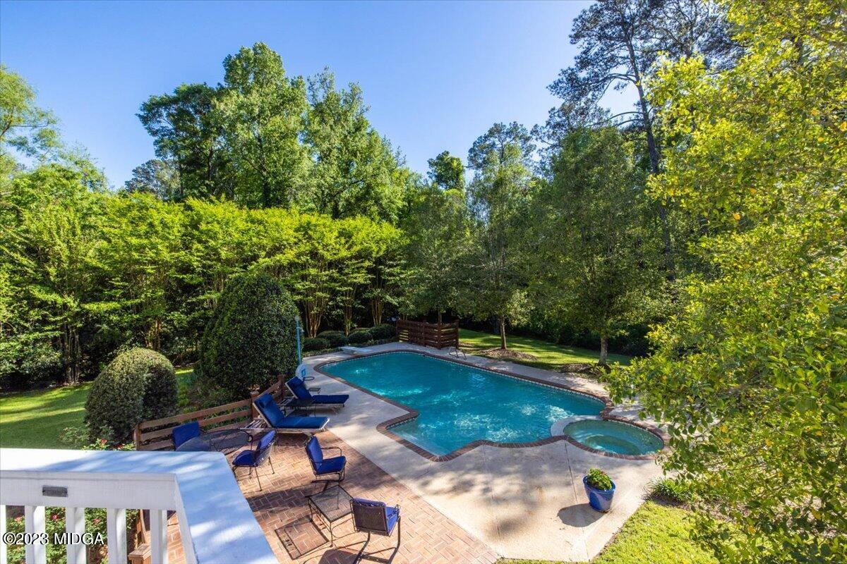 1158 St Andrews Drive Macon, GA 31210 - Photo 55 of 79 a view of a backyard with swimming pool