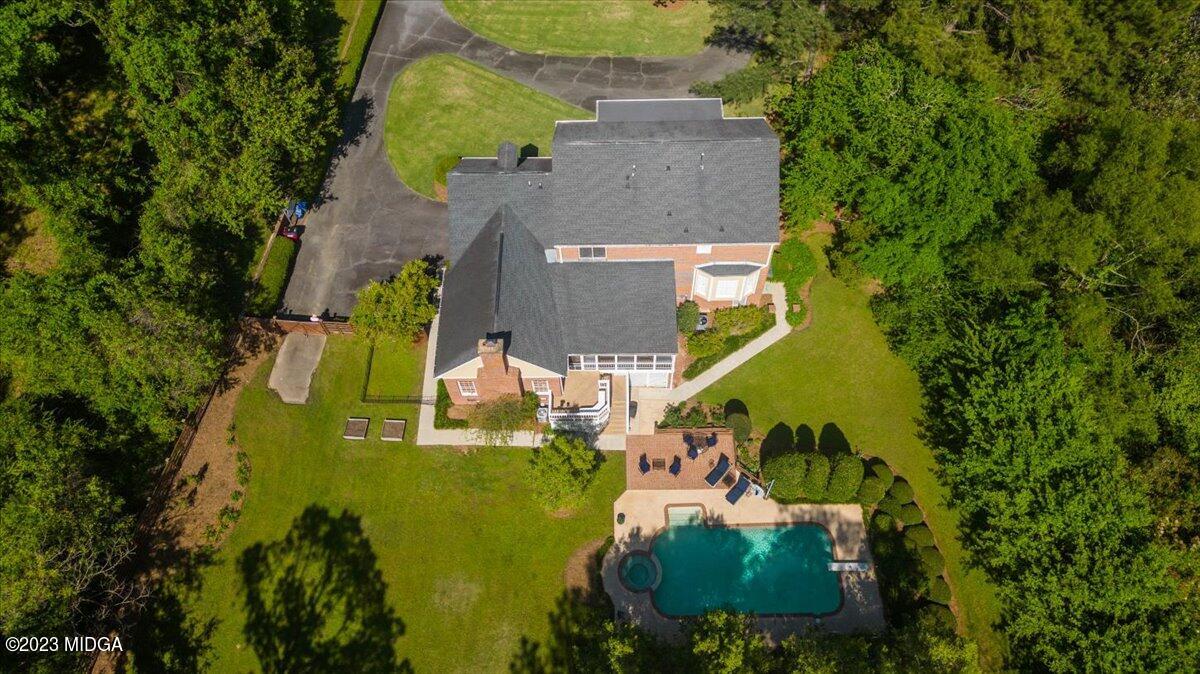 1158 St Andrews Drive Macon, GA 31210 - Photo 76 of 79 an aerial view of a house with a yard swimming pool and outdoor seating