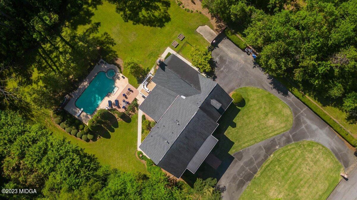 1158 St Andrews Drive Macon, GA 31210 - Photo 78 of 79 an aerial view of a house with a swimming pool