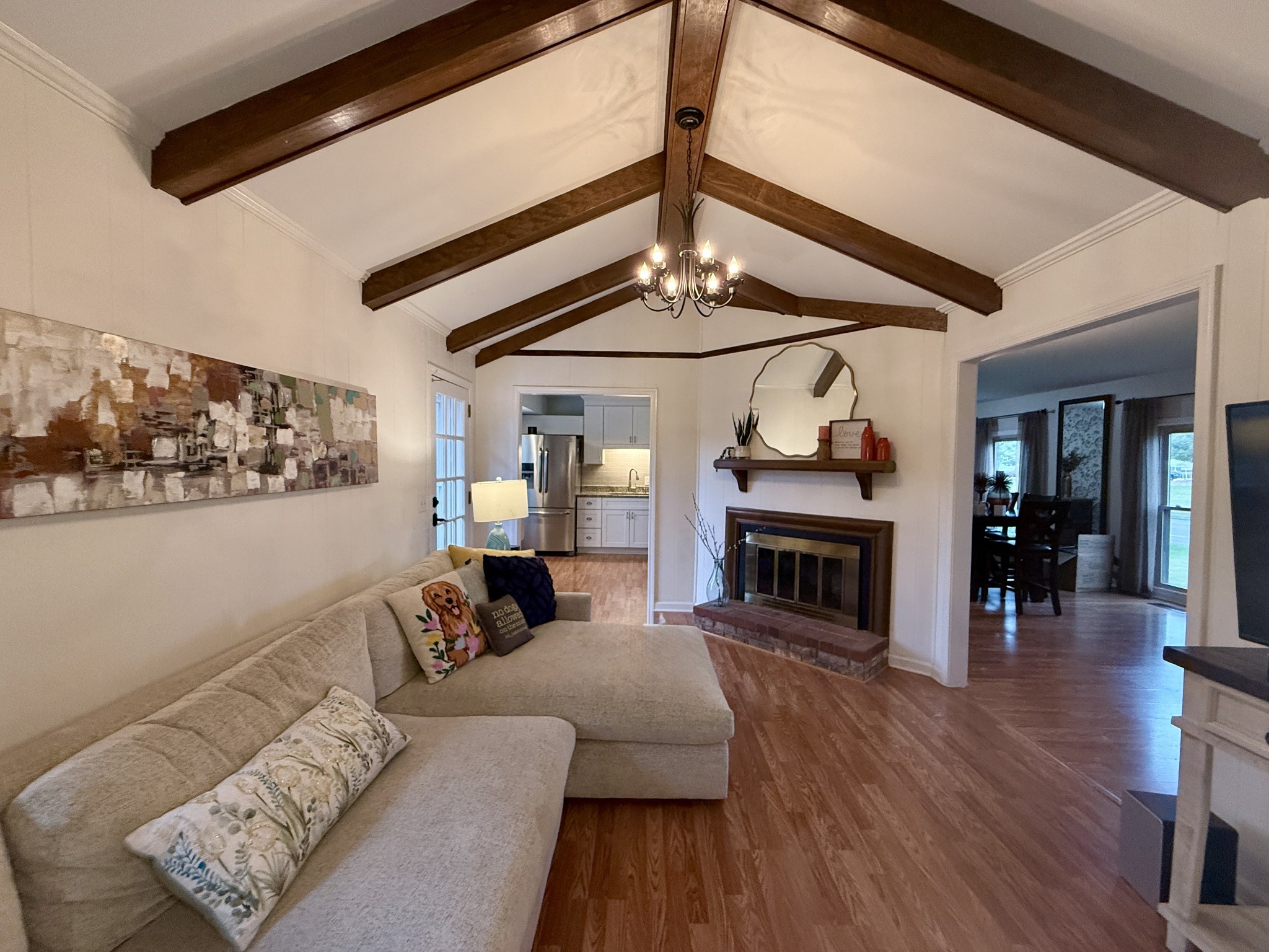705 Baugh Road Nashville, TN 37221 - Photo 13 of 31 a living room with furniture and a fireplace