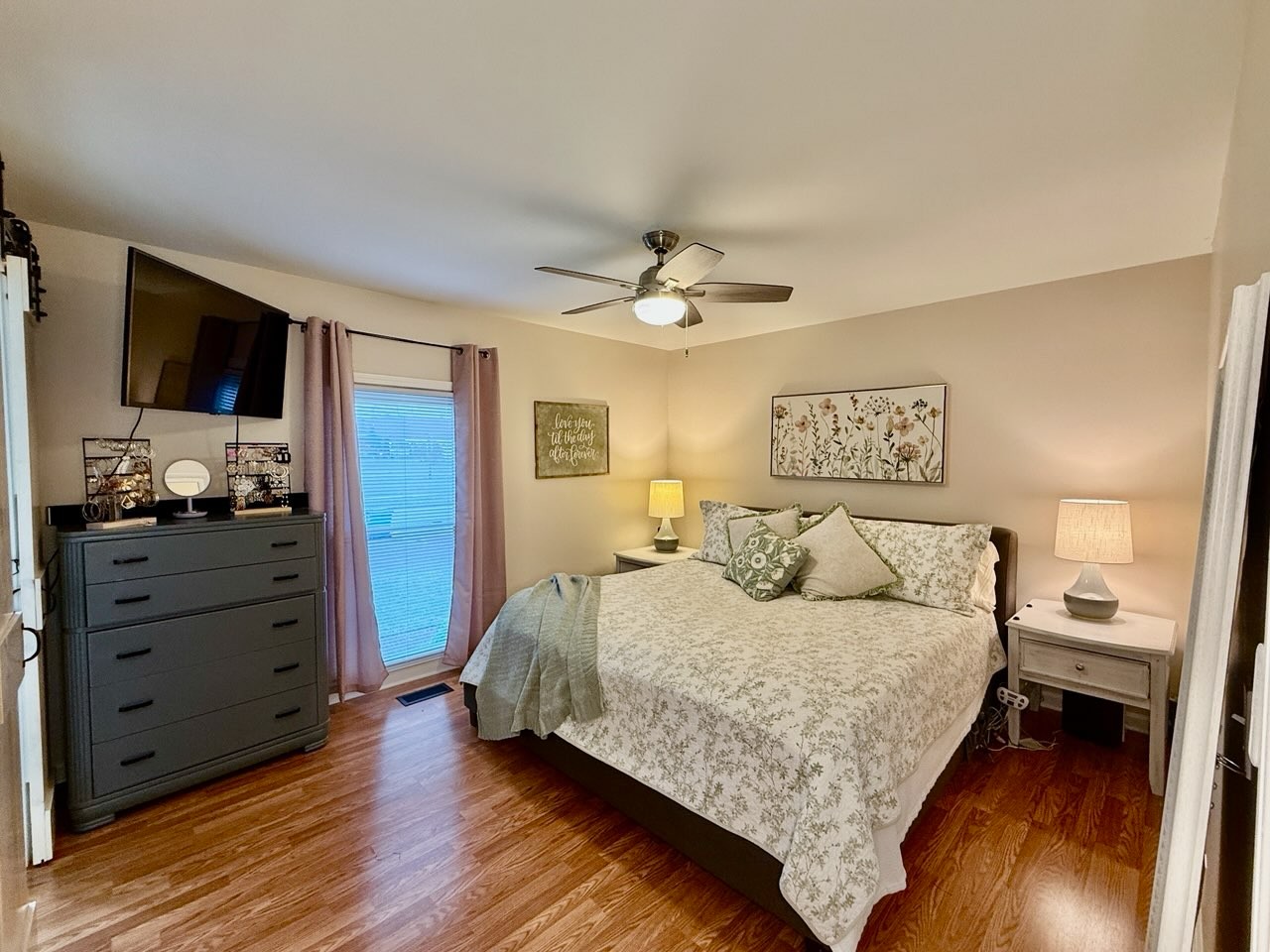 705 Baugh Road Nashville, TN 37221 - Photo 16 of 31 a bedroom with a large bed and a tv