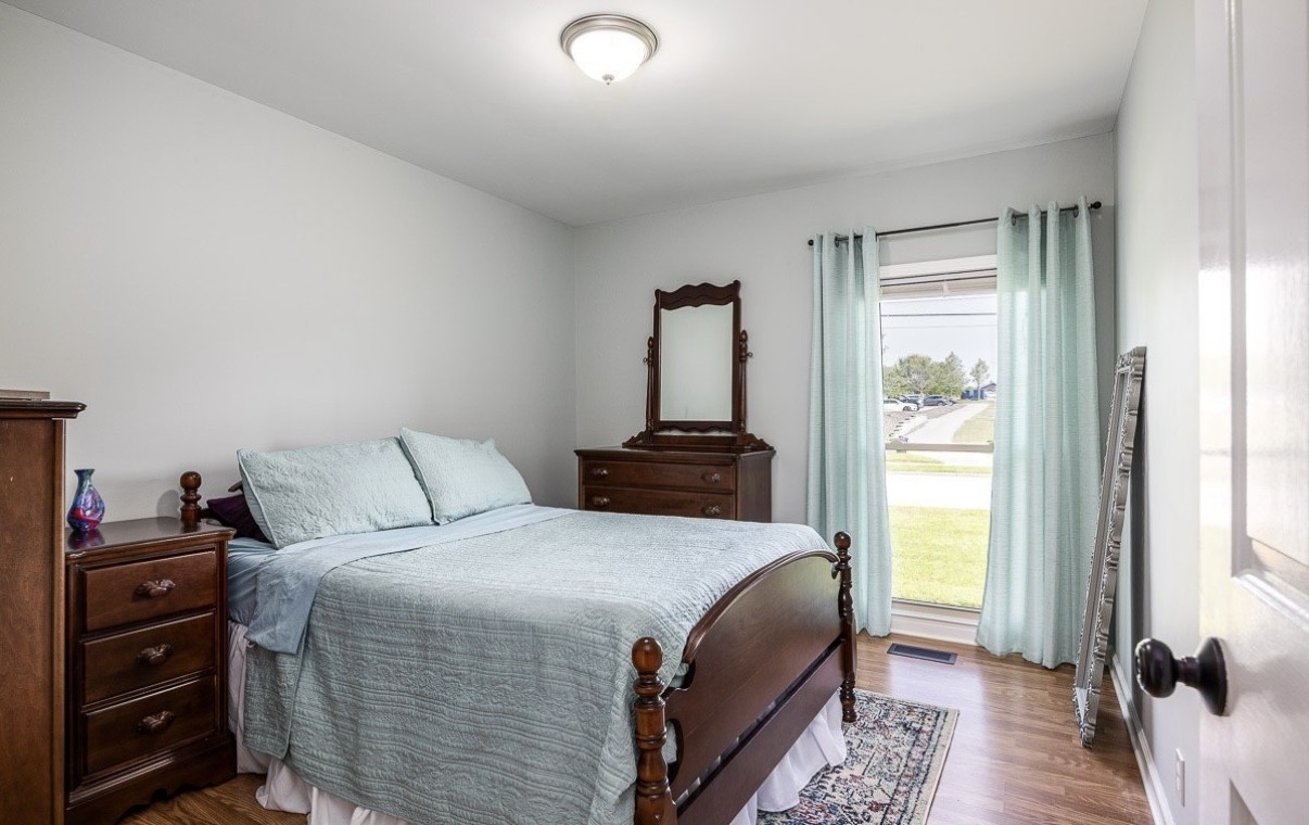 705 Baugh Road Nashville, TN 37221 - Photo 20 of 31 a bed room with a bed and a window
