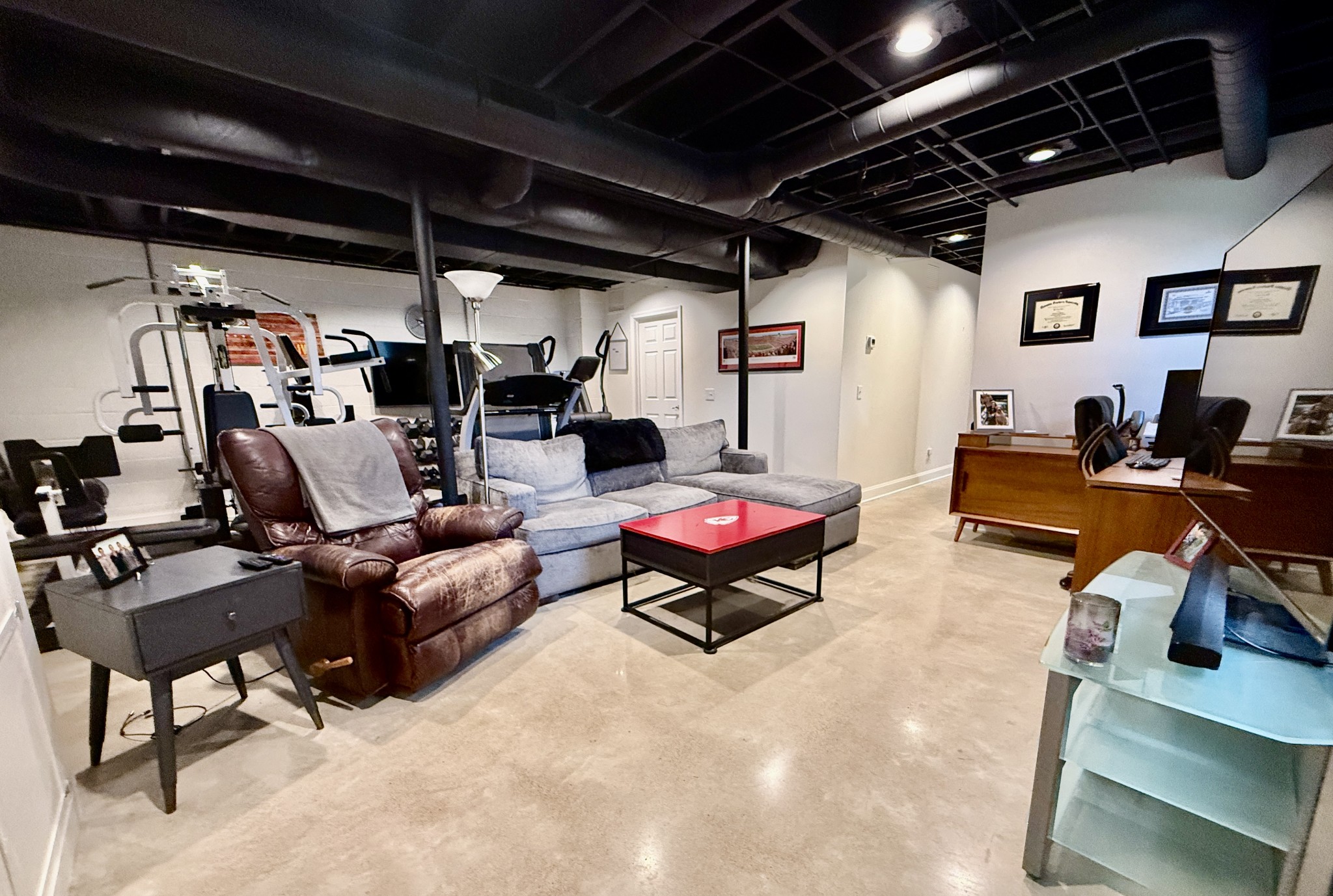 705 Baugh Road Nashville, TN 37221 - Photo 22 of 31 a living room with furniture and a flat screen tv
