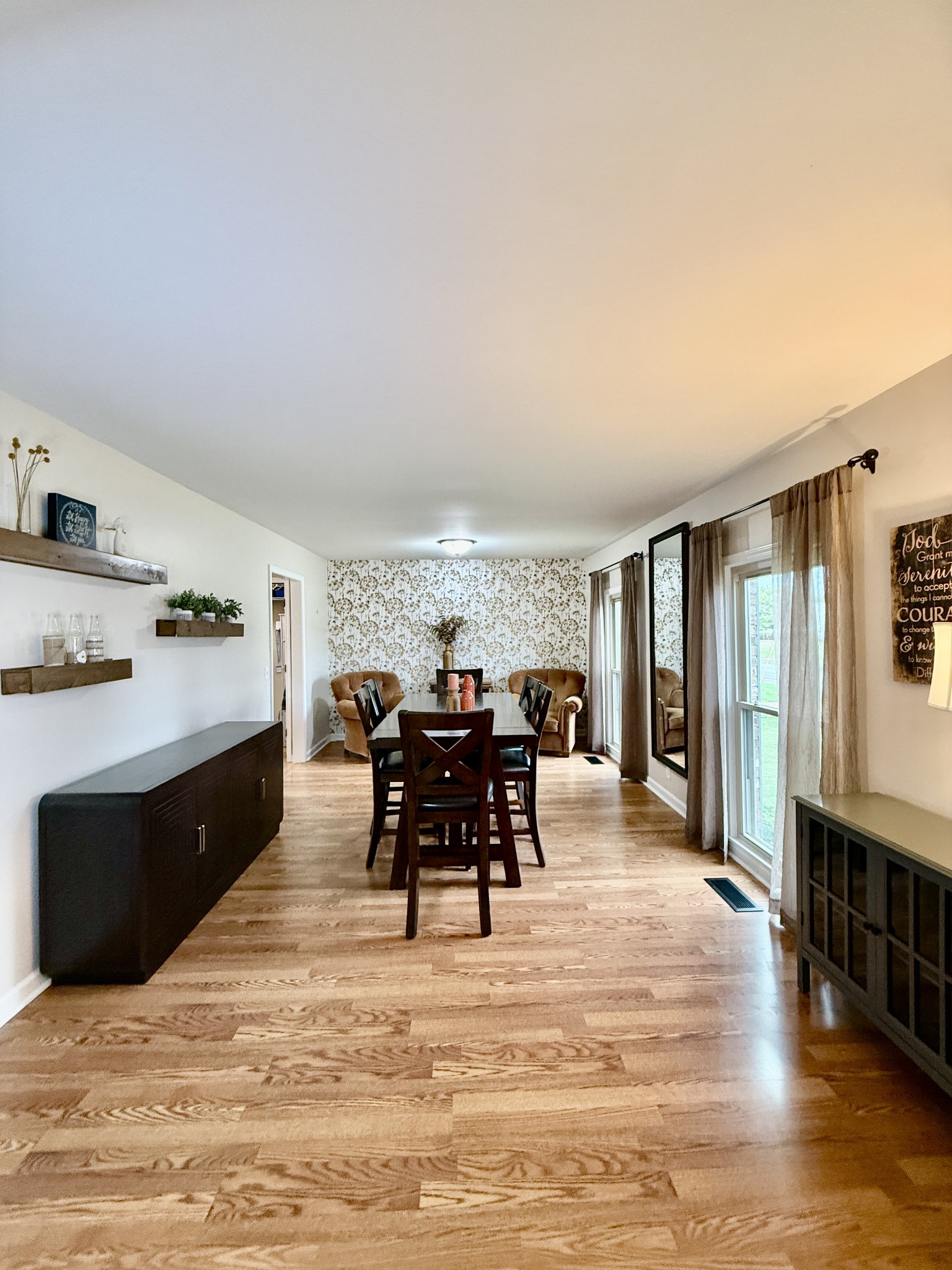 705 Baugh Road Nashville, TN 37221 - Photo 5 of 31 a view of a dining room with furniture and chandelier