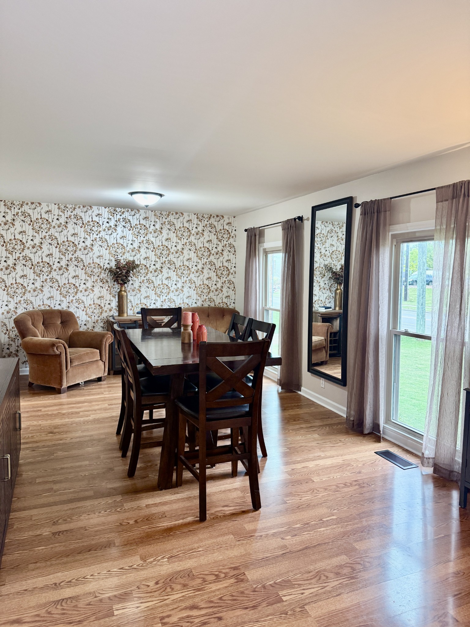 705 Baugh Road Nashville, TN 37221 - Photo 6 of 31 a view of a dining room with furniture and wooden floor