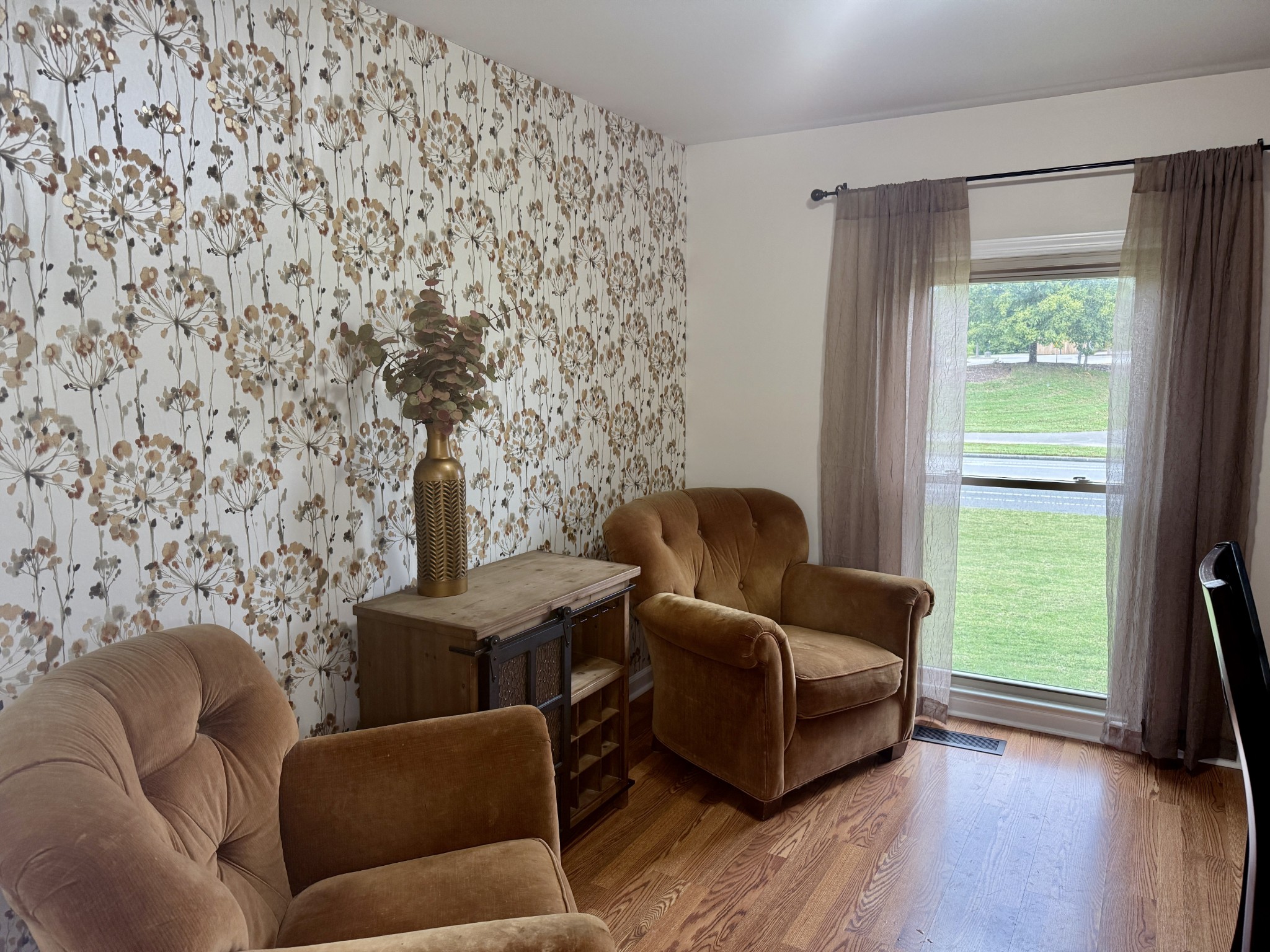 705 Baugh Road Nashville, TN 37221 - Photo 7 of 31 a living room with furniture and a floor to ceiling window