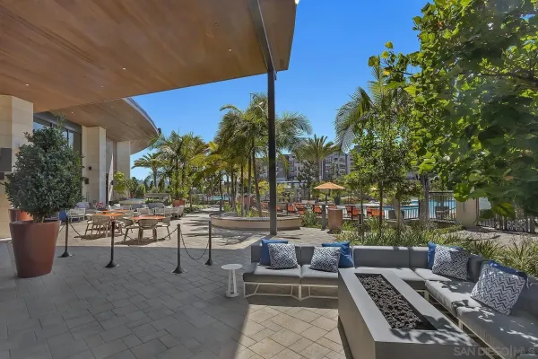 a view of a patio with couches and chairs