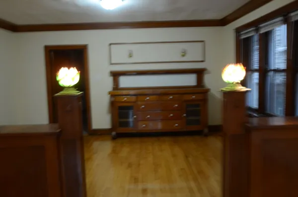 a view of fireplace and wooden floor