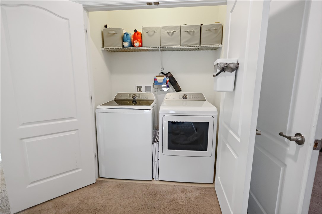 1782 Berkshire Circle Southwest Vero Beach, FL 32968 - Photo 27 of 35 a utility room with dryer and washer