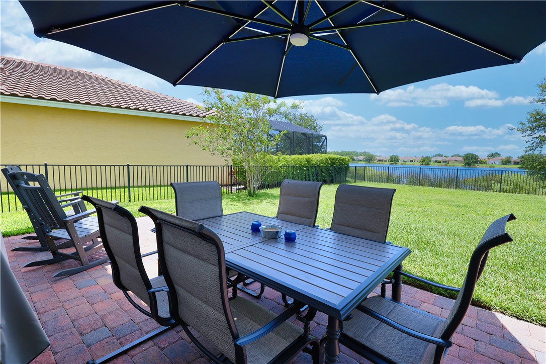 1782 Berkshire Circle Southwest Vero Beach, FL 32968 - Photo 28 of 35 a view of an outdoor sitting area with furniture