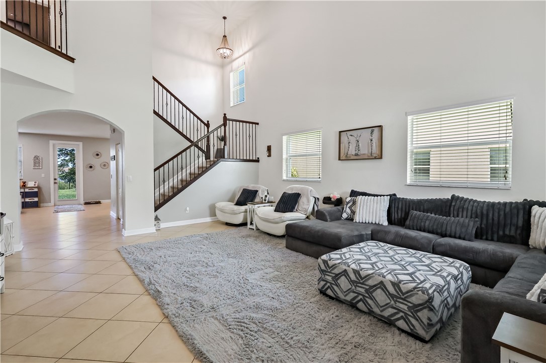 1782 Berkshire Circle Southwest Vero Beach, FL 32968 - Photo 4 of 35 a living room with furniture and a window