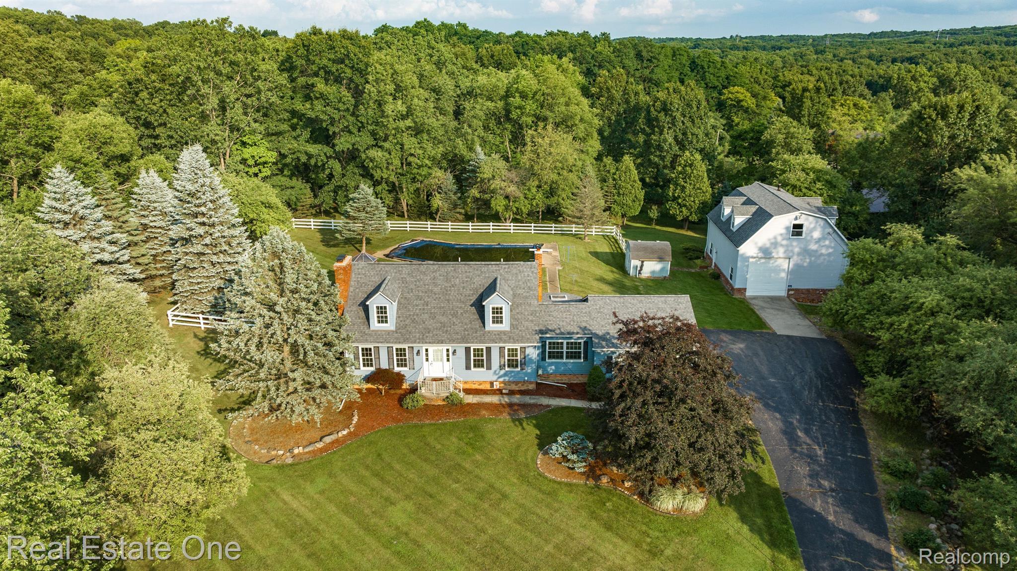 11260 Hartland Road Fenton, MI 48430 - Photo 1 of 73 WELCOME HOME!! 3-acre private haven...