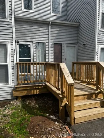 a view of deck with a chair