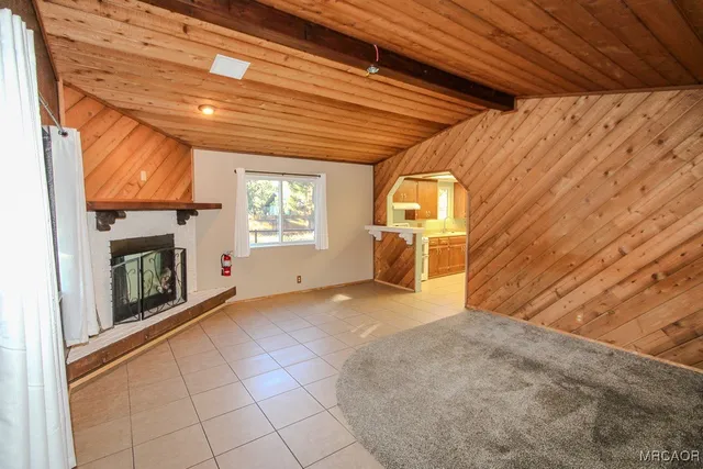 a view of empty room with windows