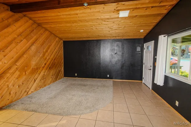 a kitchen with a stove and a sink