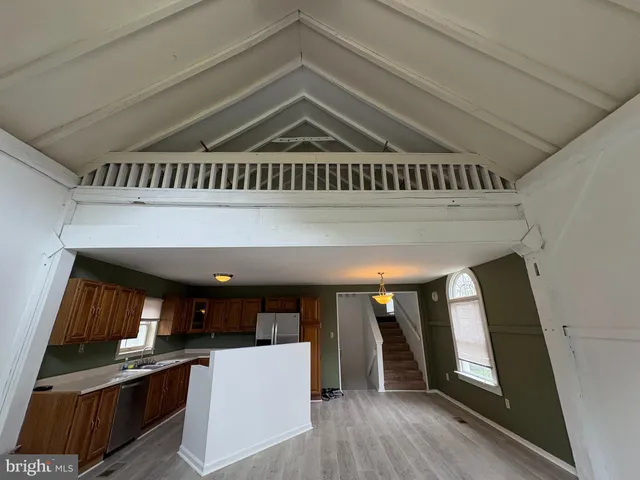 a view of a livingroom with wooden floor