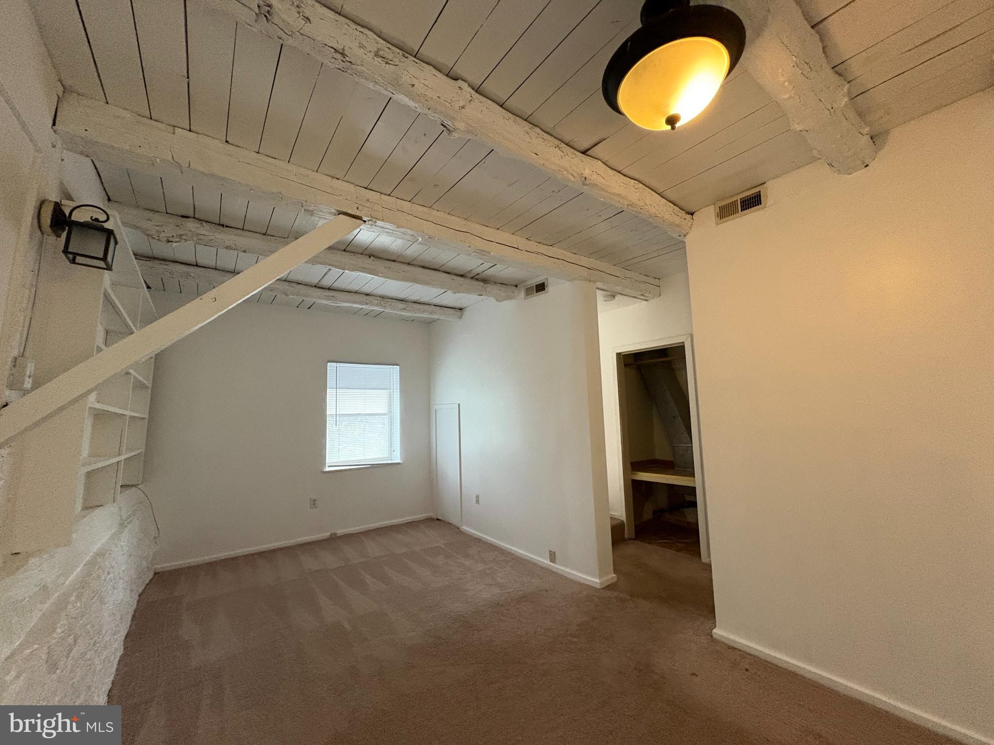 5001 Carroll Manor Road Baldwin, MD 21013 - Photo 8 of 18 a view of an empty room with a window