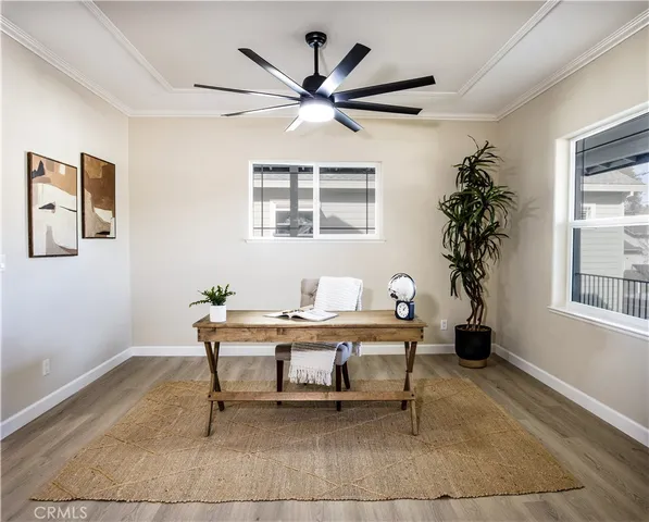 a work room with furniture and window