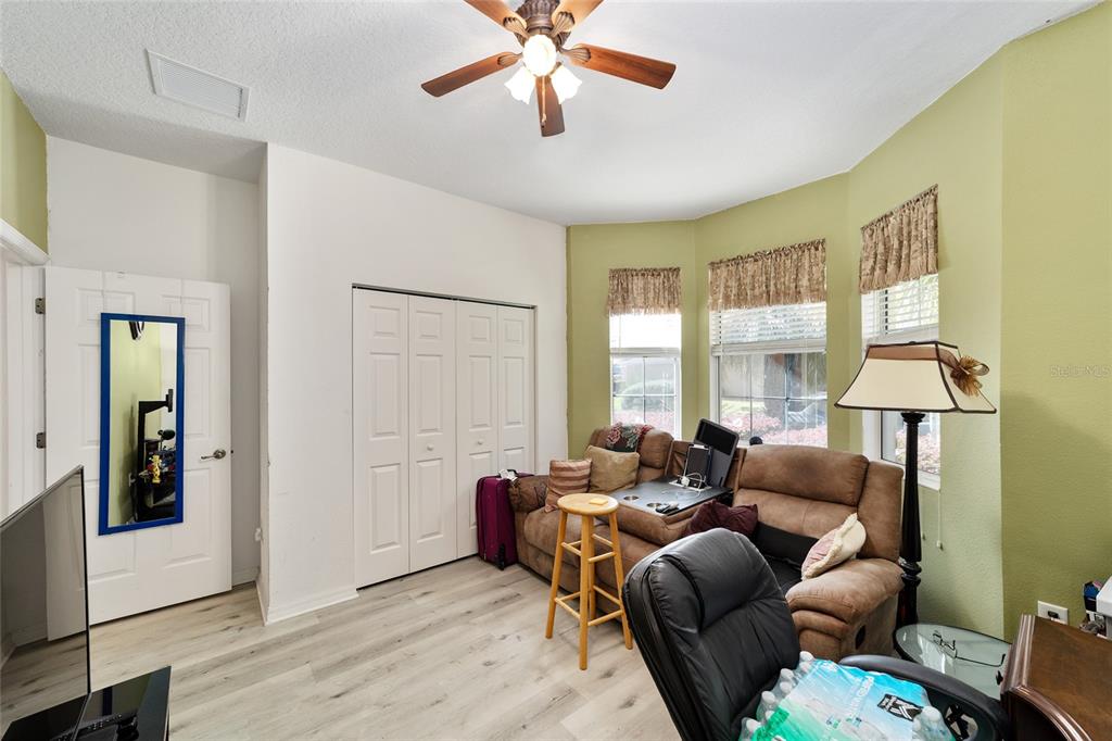 8364 Southwest 79th Circle Ocala, FL 34476 - Photo 29 of 40 a living room with furniture and a window