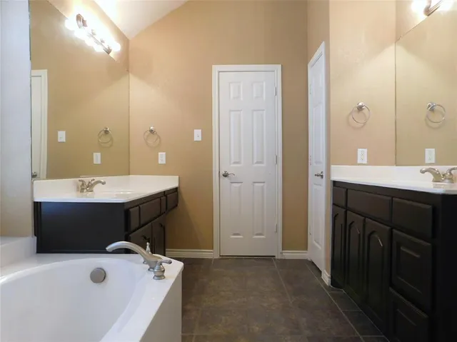 a bathroom with a sink and a bathtub