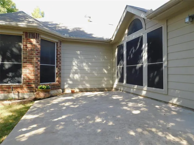 a view of outdoor space and front view of a house