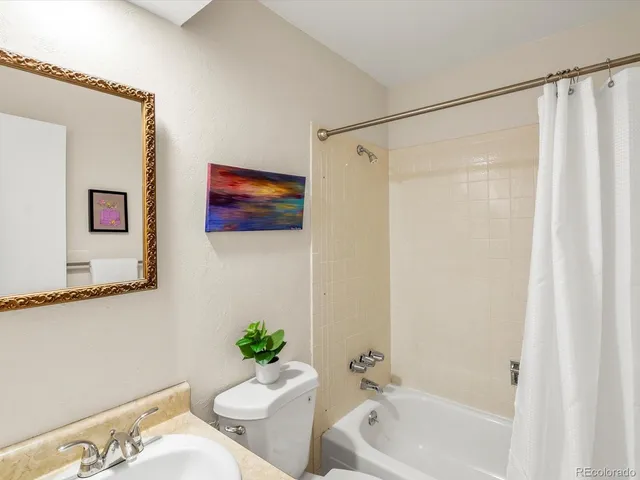 a front view of a house with garden fireplace and windows