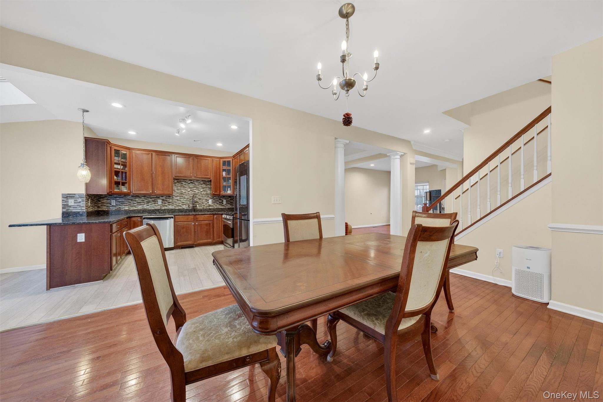 1123 Cold Spring Road Fishkill, NY 12524 - Photo 11 of 44 a view of a dining room with furniture and wooden floor
