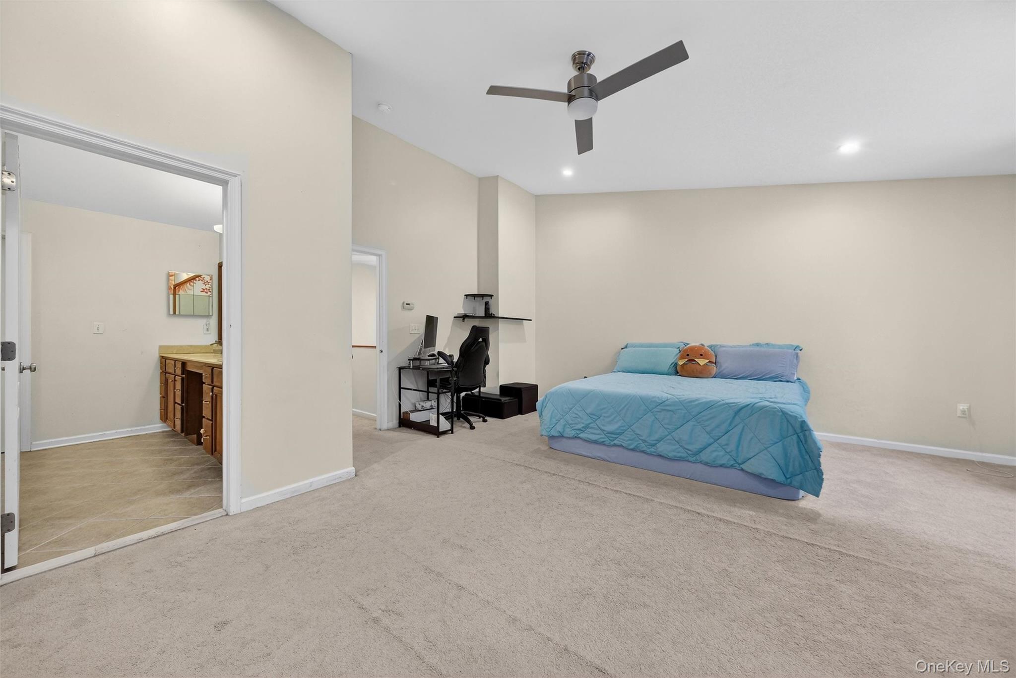 1123 Cold Spring Road Fishkill, NY 12524 - Photo 25 of 44 a bedroom with furniture and a ceiling fan