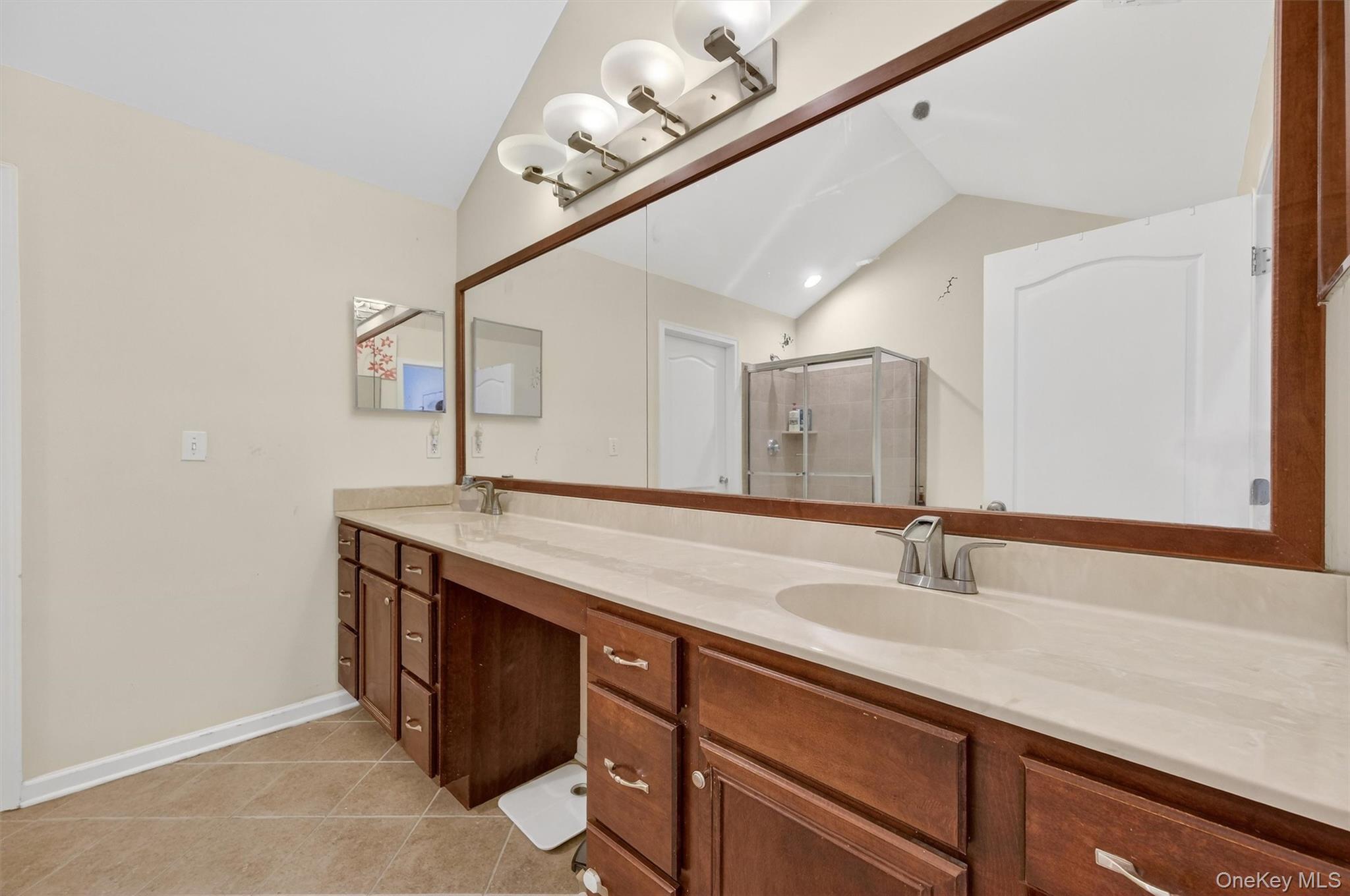 1123 Cold Spring Road Fishkill, NY 12524 - Photo 26 of 44 a bathroom with a sink and a mirror