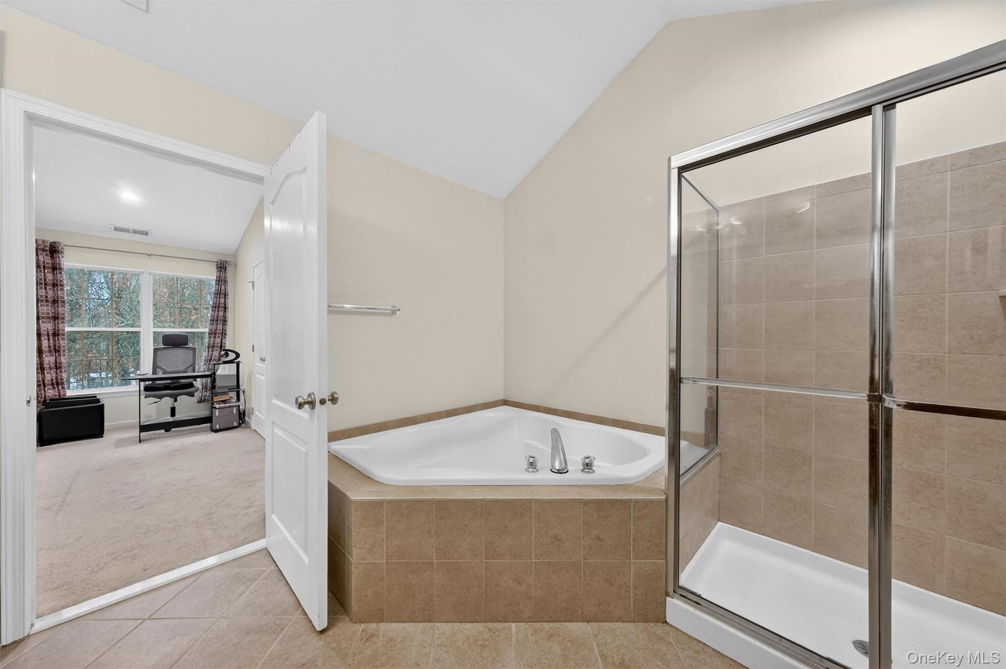 1123 Cold Spring Road Fishkill, NY 12524 - Photo 28 of 44 a bathroom with a tub and shower