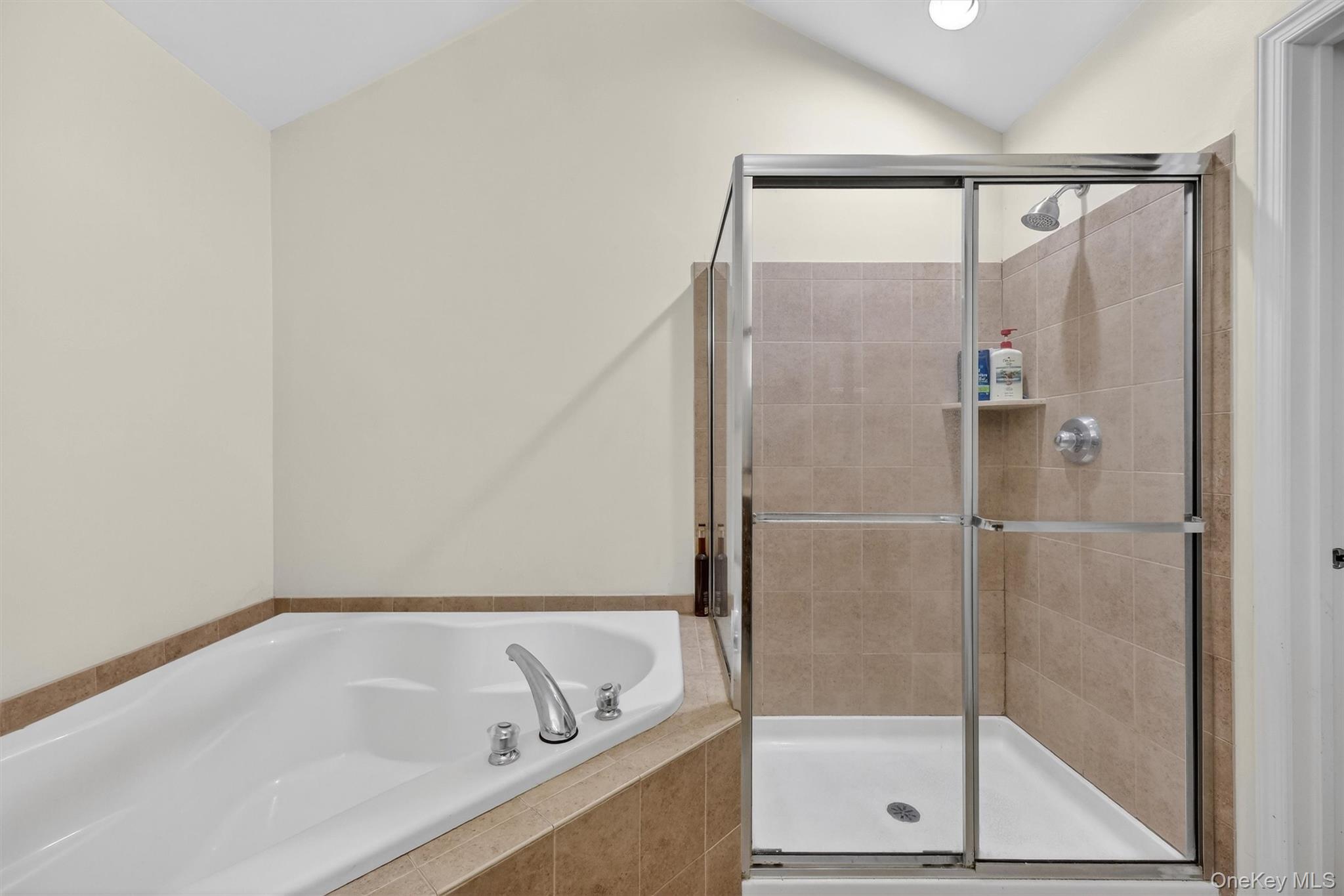 1123 Cold Spring Road Fishkill, NY 12524 - Photo 29 of 44 a bathroom with a bathtub and a shower