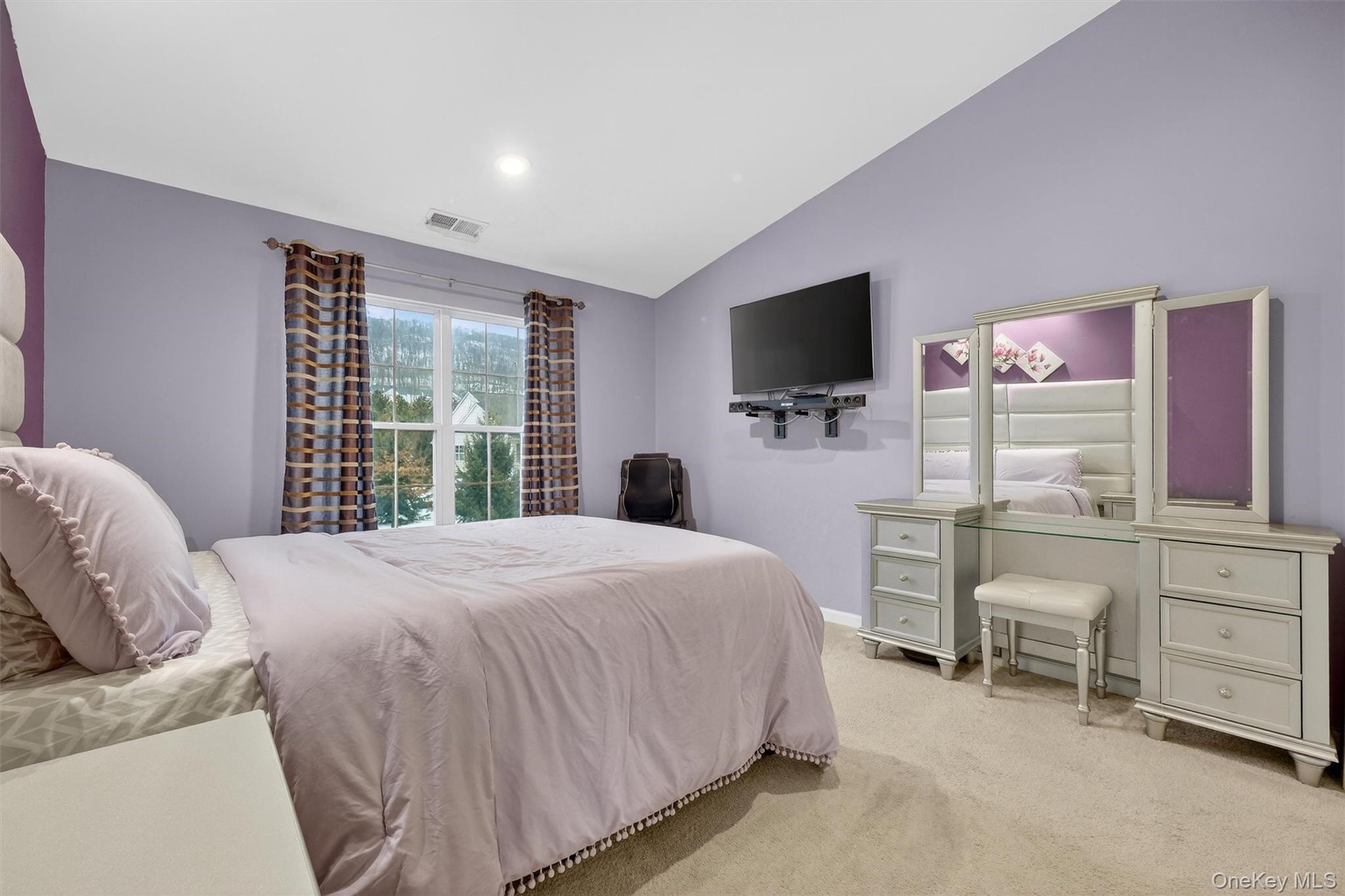 1123 Cold Spring Road Fishkill, NY 12524 - Photo 31 of 44 a bedroom with a bed and a flat screen tv