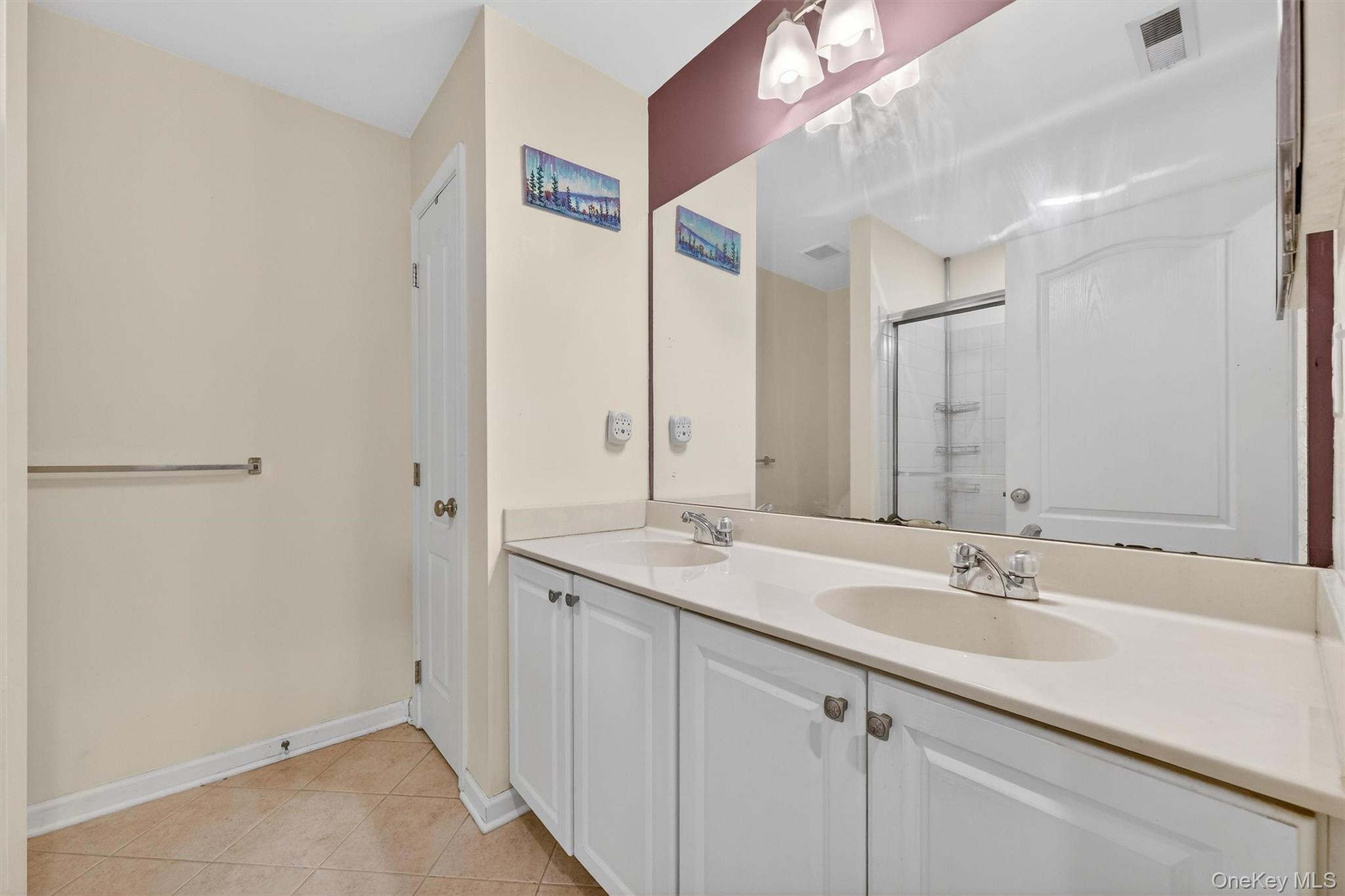 1123 Cold Spring Road Fishkill, NY 12524 - Photo 33 of 44 a bathroom with a sink and a mirror