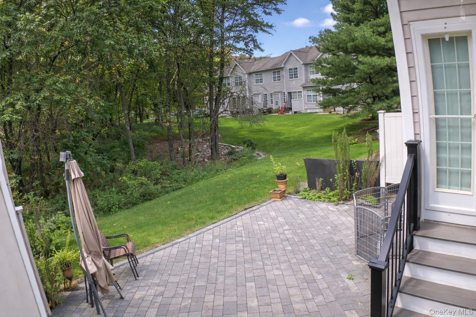 1123 Cold Spring Road Fishkill, NY 12524 - Photo 37 of 44 a view of a chair and table in backyard of the house
