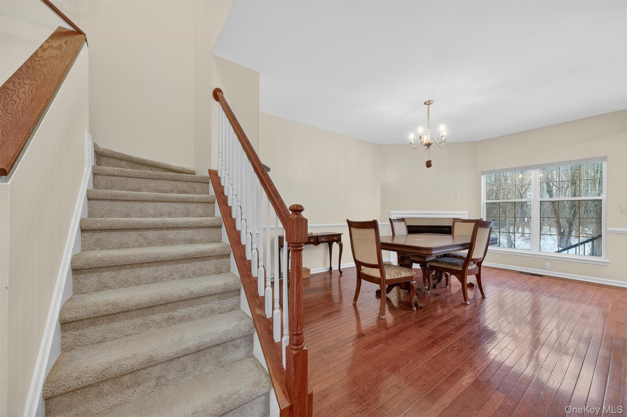 1123 Cold Spring Road Fishkill, NY 12524 - Photo 9 of 44 a view of a dining room with furniture and wooden floor