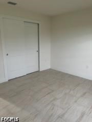 801 Southwest Raintree Boulevard LaBelle, FL 33935 - Photo 13 of 15 a view of empty room