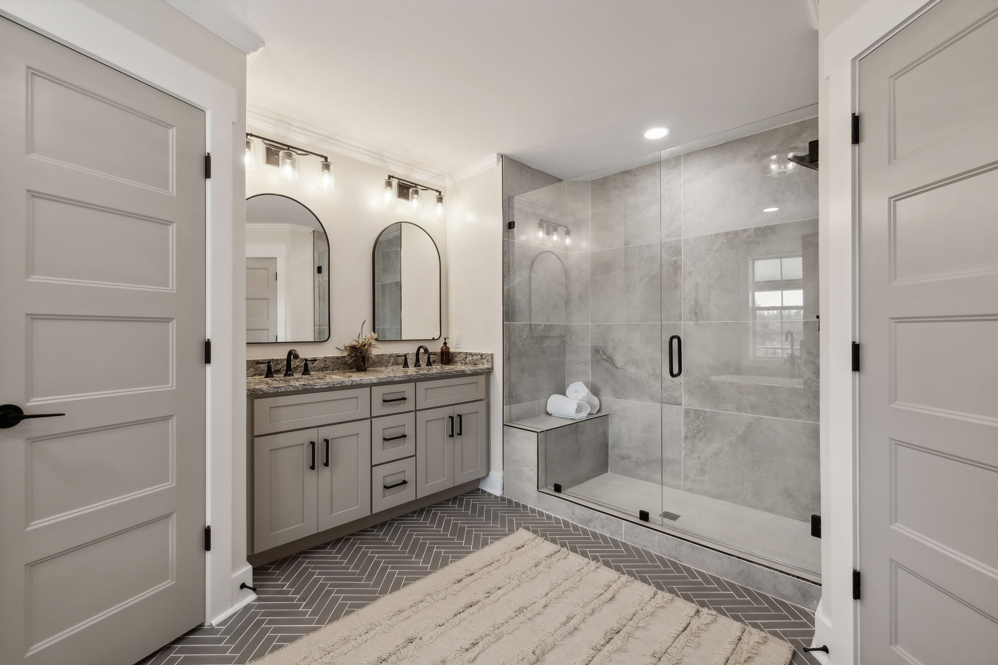 4739 Beech Log Road Lebanon, TN 37090 - Photo 15 of 33 a bathroom with a double vanity sink mirror and shower
