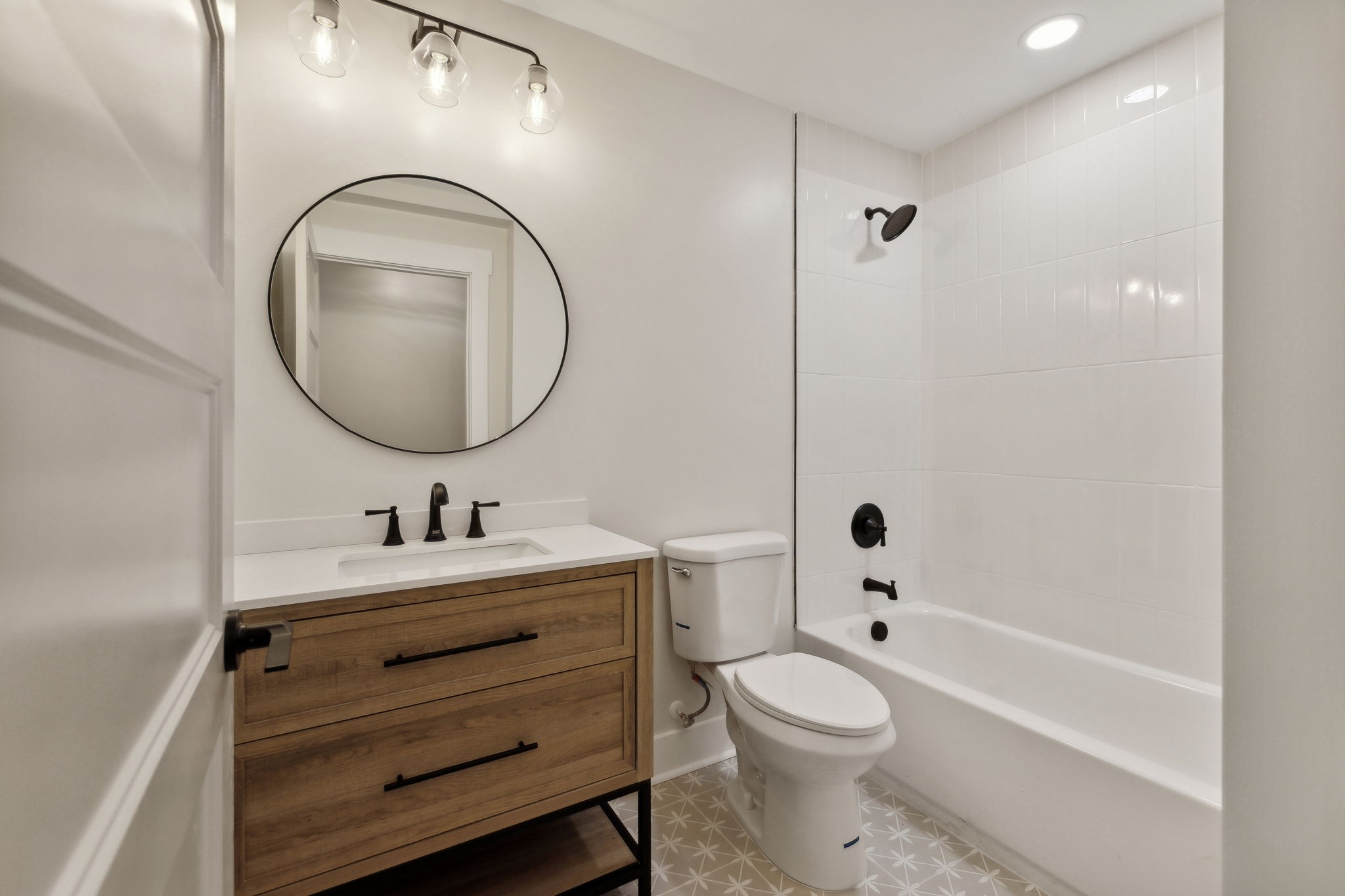 4739 Beech Log Road Lebanon, TN 37090 - Photo 18 of 33 a bathroom with a toilet a sink and a mirror