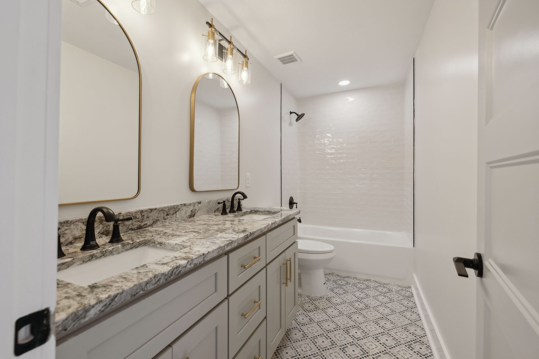 4739 Beech Log Road Lebanon, TN 37090 - Photo 22 of 33 a bathroom with a granite countertop sink mirror vanity and toilet