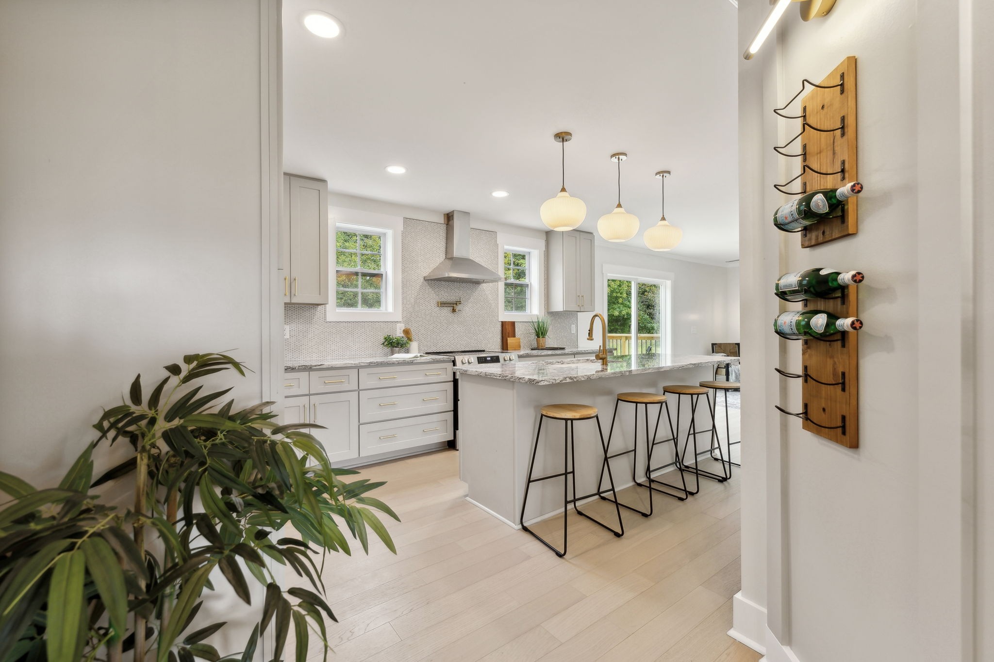 4739 Beech Log Road Lebanon, TN 37090 - Photo 8 of 33 a kitchen with kitchen island a counter top space a sink stainless steel appliances and cabinets