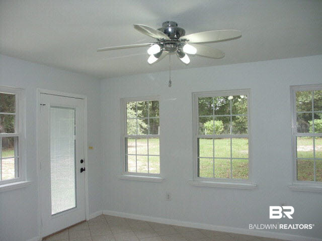 9092 Soldier Creek Road Lillian, AL 36549 - Photo 14 of 19 Sun Room With AC