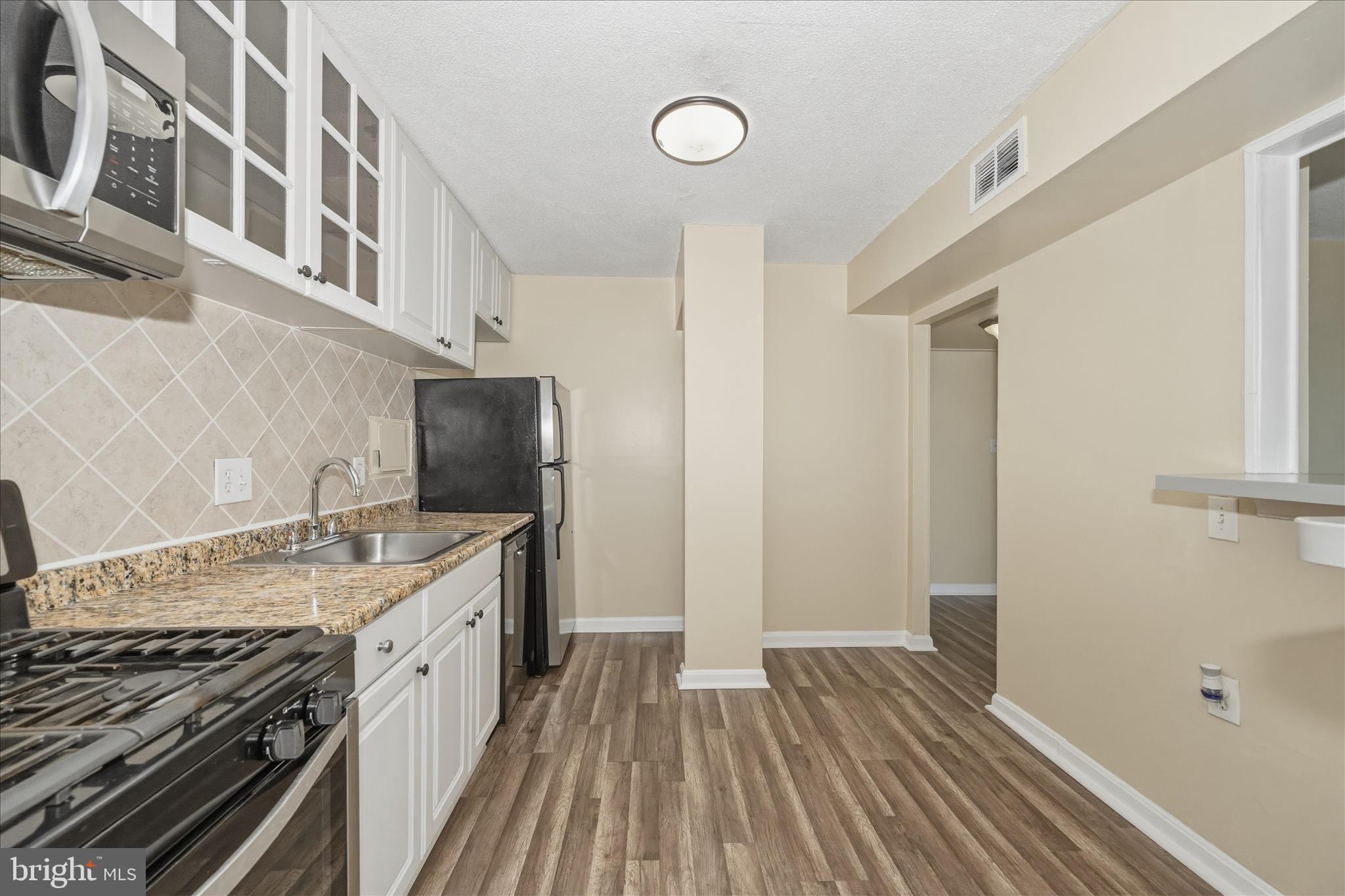 1836 Metzerott Road, Unit 1504 Hyattsville, MD 20783 - Photo 22 of 45 Kitchen