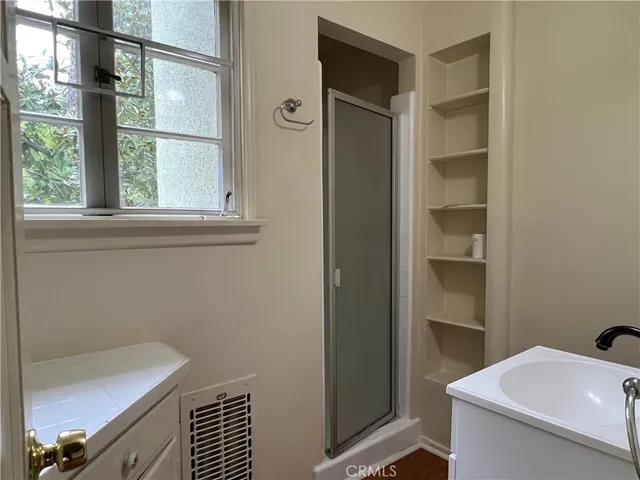 a bathroom with a sink and a vanity